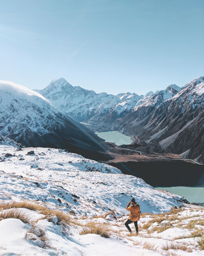Man hiking in snowy landscape